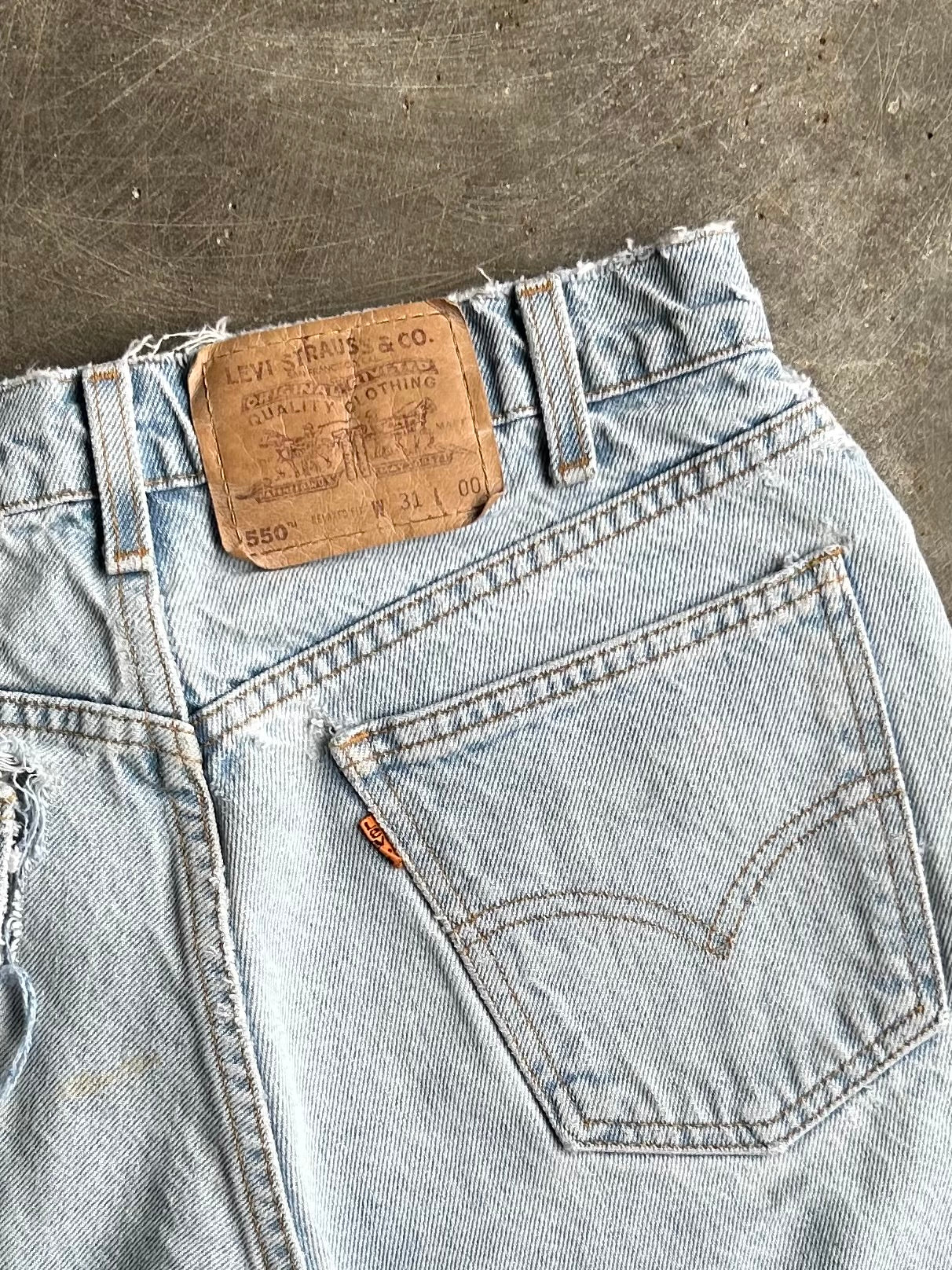 Vintage Levi’s 550 Orange Tab Denim Shorts - 27