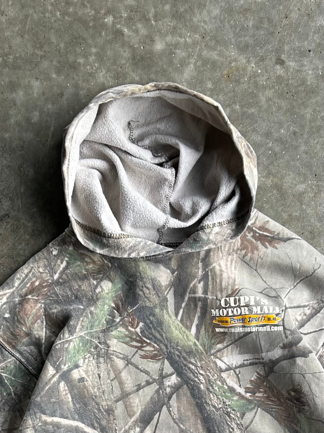 Cupi’s Motor Mall Russell Outdoors Camo Hoodie - L