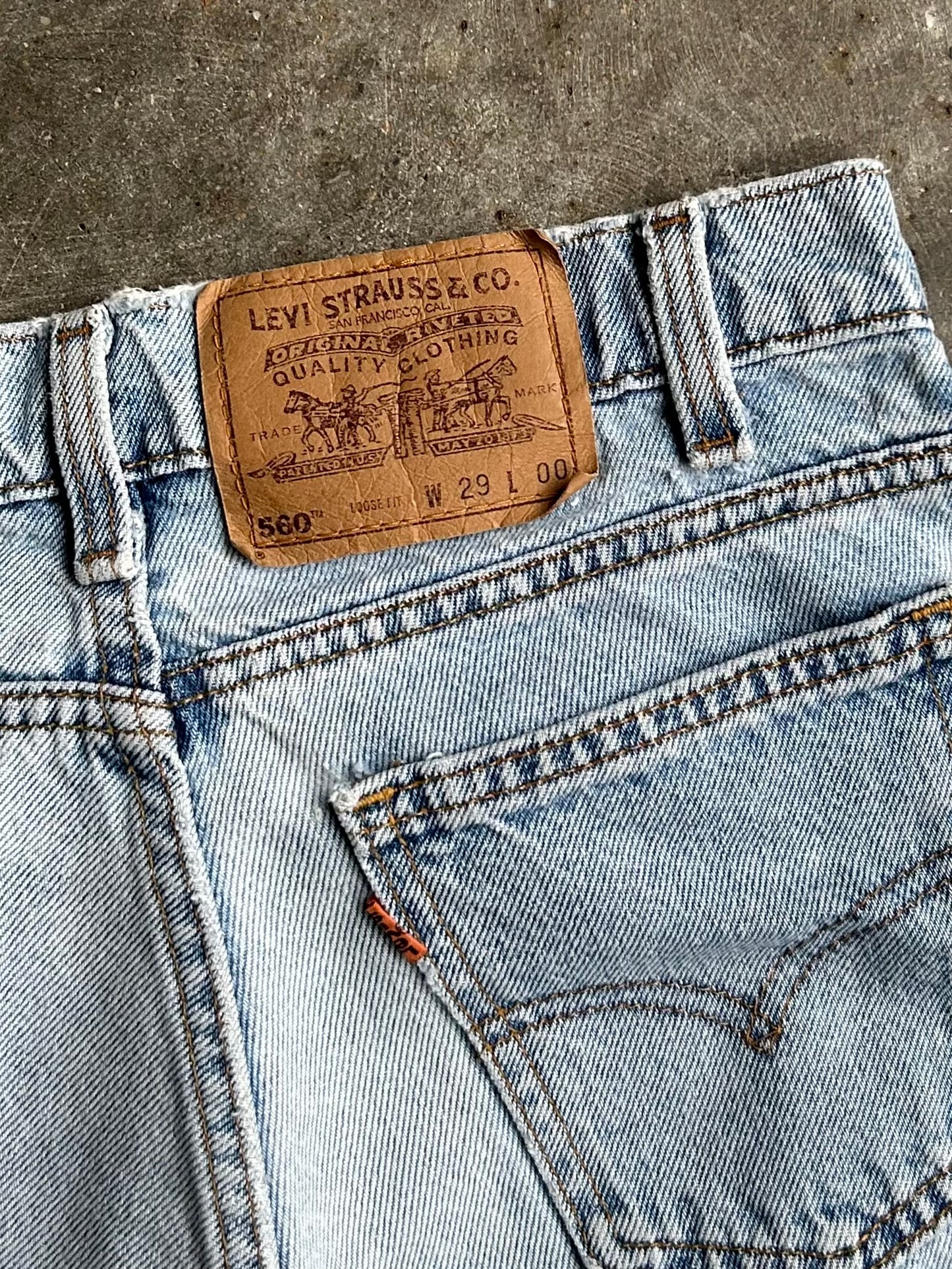 Vintage Levi’s 560 Orange Tab Denim Shorts - 28