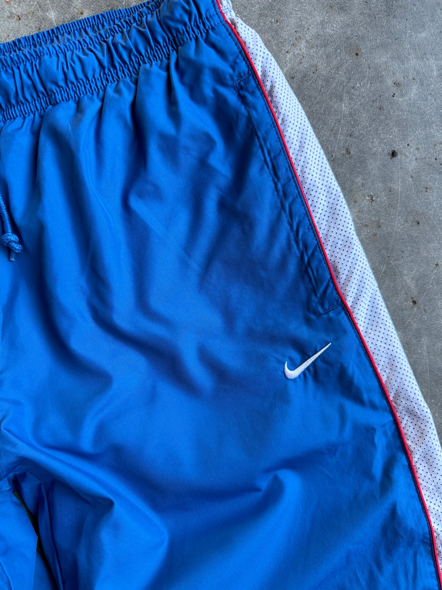 Vintage Blue Nike Athletic Dept. Track Pants - M